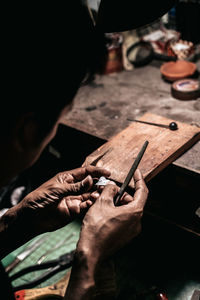 Person working on wood