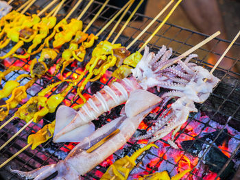 Close-up of meat on barbecue grill