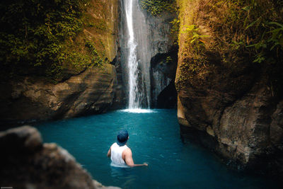 High angle view of waterfall in forest
