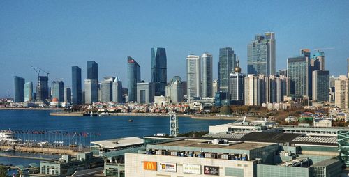 Cityscape against blue sky