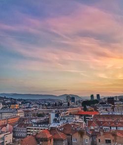 High angle view of townscape against sky at sunset