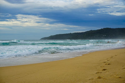 Scenic view of beach against sky