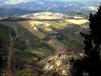 Aerial view of agricultural field against sky