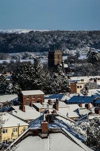 High angle view of houses in city during winter