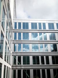 Low angle view of modern building against sky