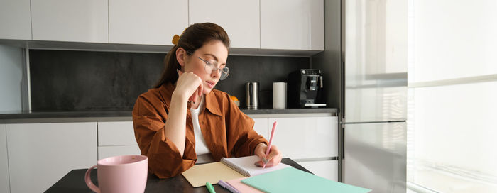 Businesswoman working at home