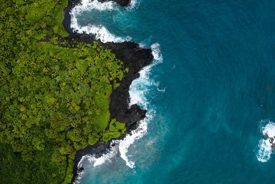 High angle view of sea and rocks