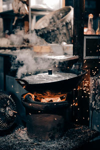 Utennsil on stove in kitchen at restaurant