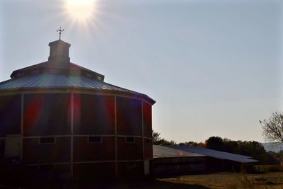 Low angle view of building against sky during sunset