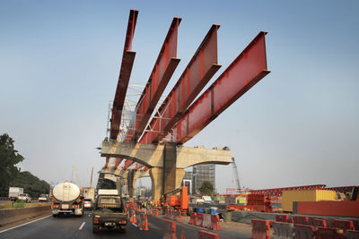 View of bridge in city against clear sky