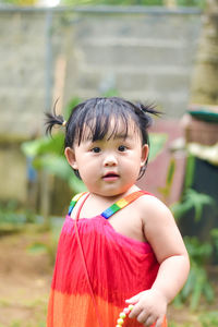 Portrait of cute girl looking away