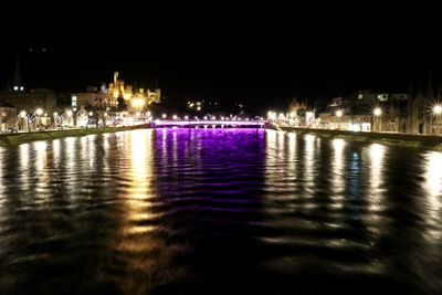 View of illuminated city at night