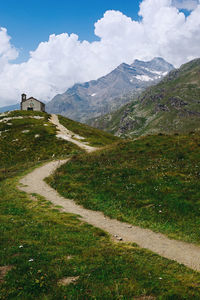 Scenic view of landscape and mountains against sky