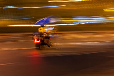 Light trails on street at night