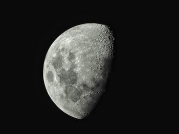 Low angle view of moon against sky at night