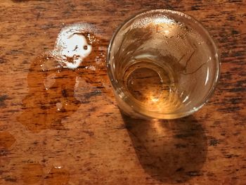 High angle view of wineglass on table