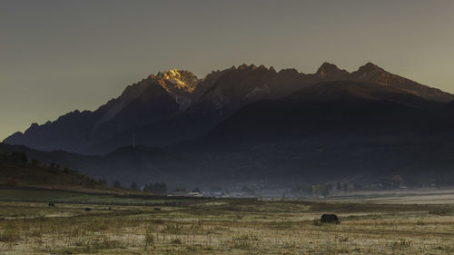 Scenic view of mountains against sky