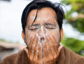 Close-up portrait of young man outdoors