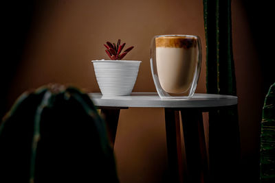 Close-up of coffee cup on table