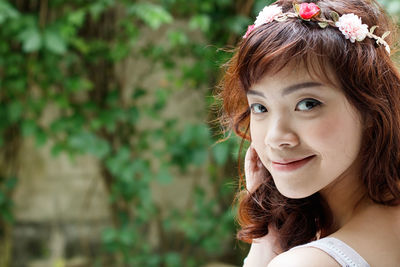 Portrait of a smiling young woman