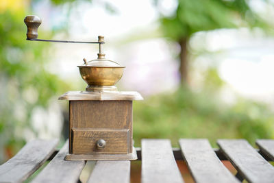 Close-up of coffee grinder on table