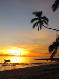 Scenic view of sea at sunset