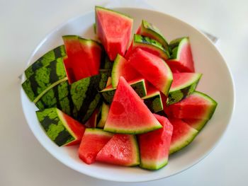 High angle view of chopped fruits in plate