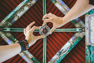 Close-up of hand holding umbrella