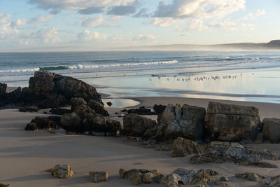 Scenic view of beach against sky