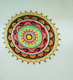 High angle view of multi colored pencils on white background