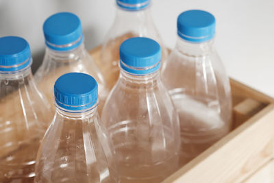 Close-up of glass bottle on table