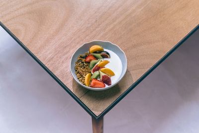 High angle view of fruits in bowl on table