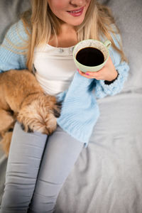 A morning with coffee and a four-legged canine friend.