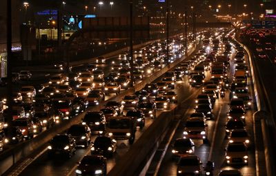High angle view of traffic on city street at night