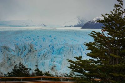 Scenic view of snowcapped mountain against sky