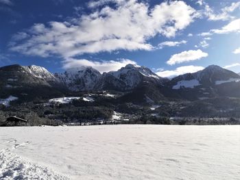 Scenic view of mountains against sky during winter