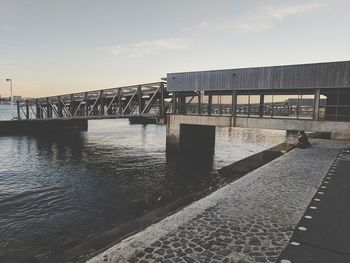 Bridge over river against sky