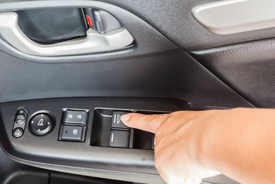 Close-up of man driving car