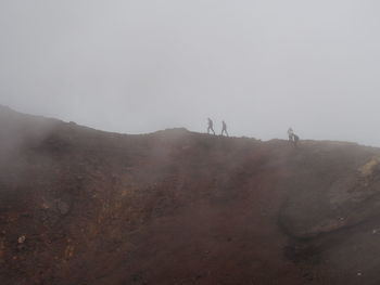 View of people on volcano