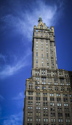 Low angle view of clock tower against sky