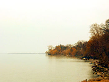 Scenic view of calm sea against clear sky