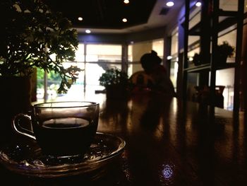 Man sitting on table at cafe