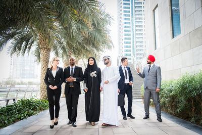 Group of people standing in front of building