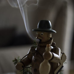 Close-up of toy emitting smoke