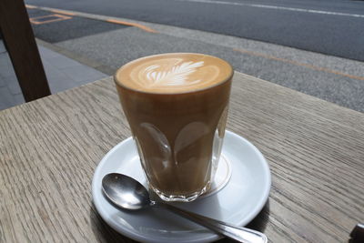 Close-up of cappuccino on table