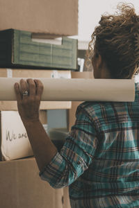 Rear view of man working at home