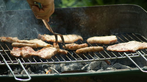 Close-up of meat on barbecue grill