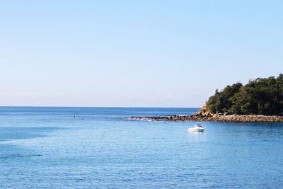 Scenic view of sea against clear sky