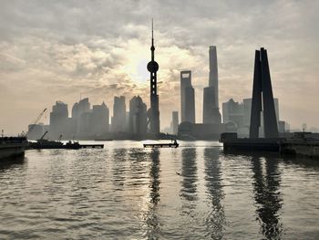 View of buildings in city at waterfront