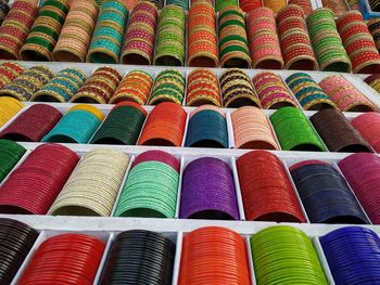 Full frame shot of multi colored bangles for sale